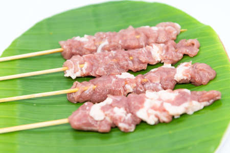 Raw pork sausage vegetable shrimp placed on dish prepare for grillの写真素材