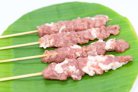 Raw pork sausage vegetable shrimp placed on dish prepare for grillの写真素材