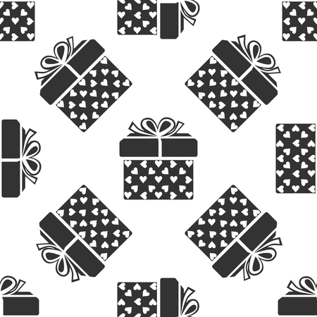 Gift box and heart icon seamless pattern on white background. Packaging Valentine's Day. Beautiful festive box tied with ribbon and bow on top. Flat design. Vector Illustrationのイラスト素材