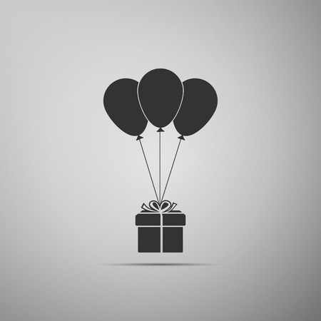 Gift box with balloons icon isolated on grey background. Flat design  Vector Illustrationのイラスト素材