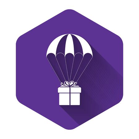 White Gift box flying on parachute icon isolated with long shadow. Delivery service, air shipping concept, bonus concept. Purple hexagon button. Vector Illustrationのイラスト素材