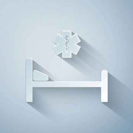 Paper cut Hospital Bed with Medical symbol of the Emergency - Star of Life icon isolated on grey background. Flat design. Paper art style. Vector Illustrationのイラスト素材