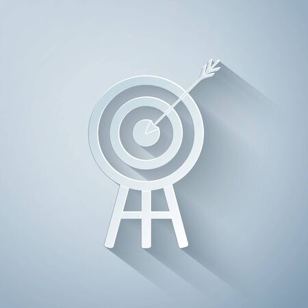 Paper cut Target with arrow icon isolated on grey background. Dart board sign. Archery board icon. Dartboard sign. Business goal concept. Paper art style. Vector Illustrationのイラスト素材