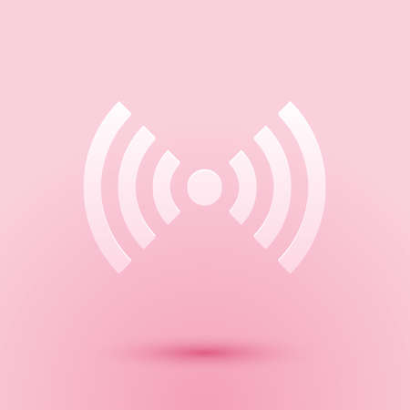 Paper cut Wi-Fi wireless internet network symbol icon isolated on pink background. Paper art style. Vectorのイラスト素材