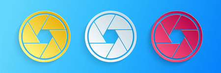 Paper cut Camera shutter icon isolated on blue background. Paper art style. Vectorのイラスト素材