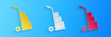 Paper cut Hand truck and boxes icon isolated on blue background. Dolly symbol. Paper art style. Vectorのイラスト素材