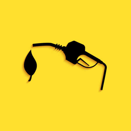 Black Bio fuel concept with fueling nozzle and leaf icon isolated on yellow background. Natural energy concept. Gas station gun sign. Long shadow style. Vectorのイラスト素材