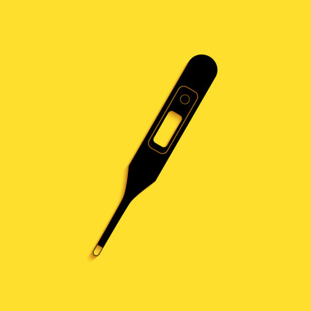 Black Medical digital thermometer for medical examination icon isolated on yellow background. Long shadow style. Vectorのイラスト素材