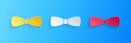 Paper cut Bow tie icon isolated on blue background. Paper art style. Vectorのイラスト素材
