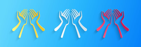 Paper cut Hands icon isolated on blue background. Paper art style. Vectorのイラスト素材