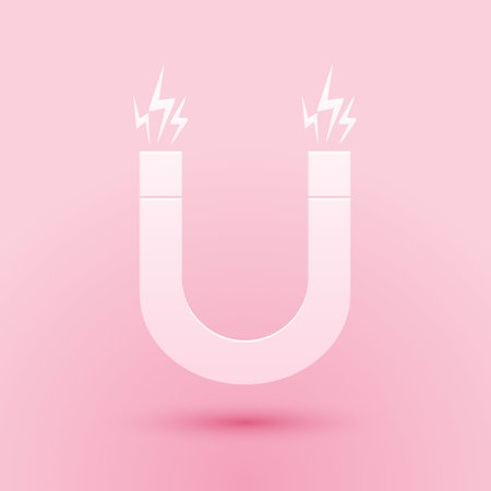 Paper cut Magnet icon isolated on pink background. Horseshoe magnet, magnetism, magnetize, attraction. Paper art style. Vectorのイラスト素材