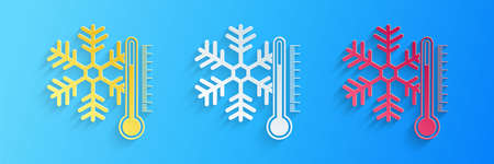 Paper cut Thermometer with snowflake icon isolated on blue background. Paper art style. Vector