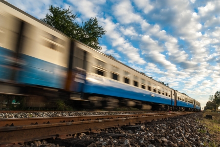 High-speed train that runs through the countryside の写真素材