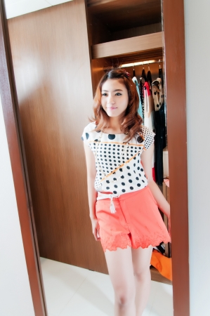 Cool teenage model girls clothes posing in the studio の写真素材