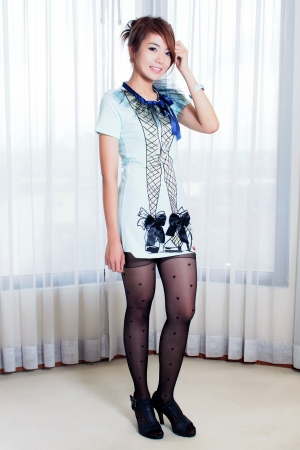 Cool teenage model girls clothes posing in the studio の写真素材