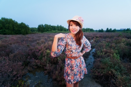 Fashion model at sunrise in white dress の写真素材