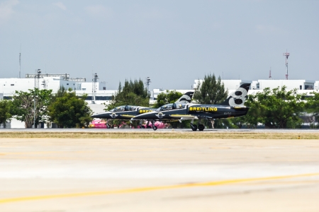 BANGKOK - MARCH 23:"Breitling Jet Team Under The Royal Sky" Breitling Team and Rayal Thai Air Force Air Show at Donmueang Bangkok Thailand  in March 23, 2013 のeditorial素材