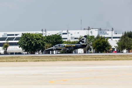 BANGKOK - MARCH 23:"Breitling Jet Team Under The Royal Sky" Breitling Team and Rayal Thai Air Force Air Show at Donmueang Bangkok Thailand  in March 23, 2013 のeditorial素材