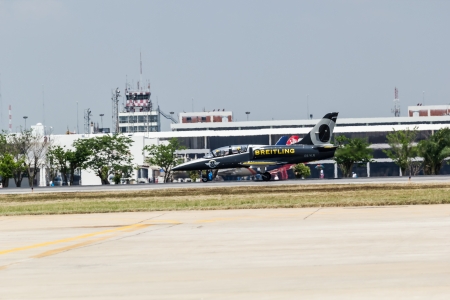 BANGKOK - MARCH 23:"Breitling Jet Team Under The Royal Sky" Breitling Team and Rayal Thai Air Force Air Show at Donmueang Bangkok Thailand  in March 23, 2013 のeditorial素材