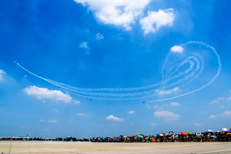 BANGKOK - MARCH 23  Breitling Jet Team Under The Royal Sky  Breitling Team and Rayal Thai Air Force Air Show at Donmueang Bangkok Thailand  in March 23, 2013 のeditorial素材