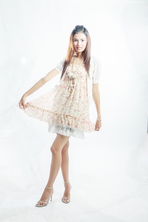 teen girl beautiful cheerful enjoying isolated on white background の写真素材