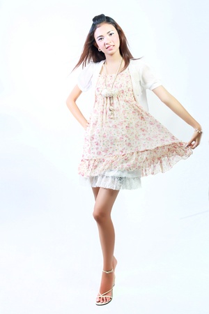 teen girl beautiful cheerful enjoying isolated on white background の写真素材