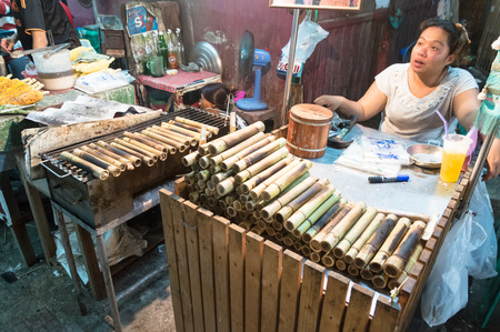 Samutsongkhram, Thailand- January 4, 2014: Unknown seller who sells souvenirs, a traditional Thai at Amphawa Floating market, the most popular floating market in Thailand. のeditorial素材
