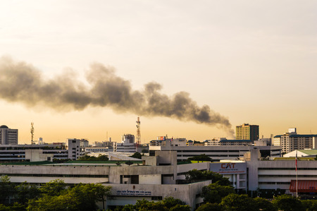 Bangkok, Thailand - July 29, 2014  Fires in the city, causing a large flame and smoke in the air is...