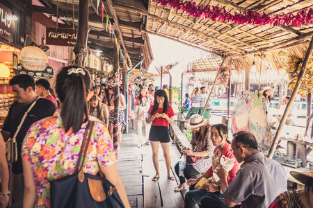Phra Nakhon Si Ayutthaya, Thailand - April 14, 2015: Ayothaya Floating Market. Has a many visitors, both Thais and foreign visitors with varieties of Thai clothes and Thai food at Ayutthaya,Thailandのeditorial素材