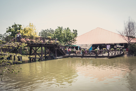 Phra Nakhon Si Ayutthaya, Thailand - April 14, 2015: Ayothaya Floating Market. Has a many visitors, both Thais and foreign visitors with varieties of Thai clothes and Thai food at Ayutthaya,Thailandのeditorial素材