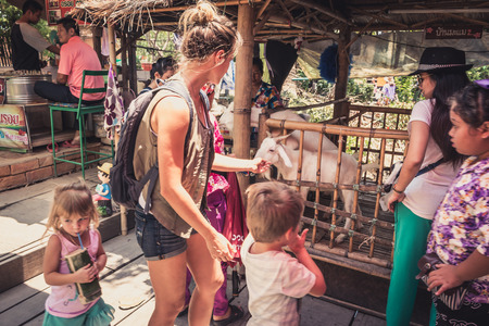 Phra Nakhon Si Ayutthaya, Thailand - April 14, 2015: Ayothaya Floating Market. Has a many visitors, both Thais and foreign visitors with varieties of Thai clothes and Thai food at Ayutthaya,Thailandのeditorial素材