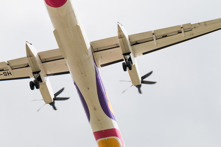 BANGKOK, THAILAND - MAY 20, 2015: HS-DQA Nok Air atr72-200 De Havilland Canada DHC-8-400 - cn 4455 landing to Don Mueang International Airport Thailand. Nok Air company is the largest low cost airlines in Thailand.のeditorial素材