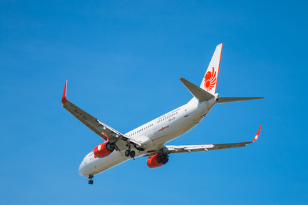 BANGKOK, THAILAND - JUNE 1, 2015: HS-LTK Thai Lion Air Boeing 737-900 landing to Don Mueang International Airport Thailand. Thai Lion Air company is the largest low cost airlines in Asia.のeditorial素材