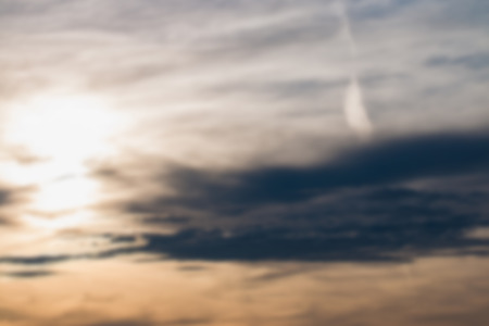 Blur effect of sky and cloud background with colorful at sunrise natureの写真素材