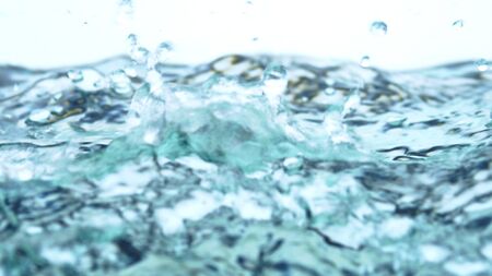Soft blur focus of Abstract water splash surface filling the frame with the water drop and waving...