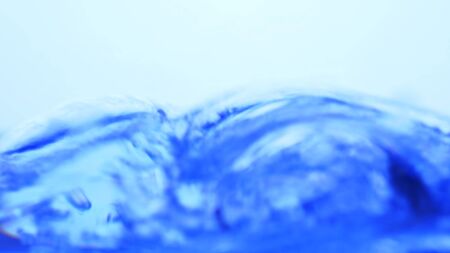 Soft blur focus of Abstract water splash surface filling the frame with the water drop and waving...