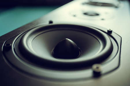 Closeup of black premium loudspeaker for music and home theater system with color mood and tone styleの写真素材