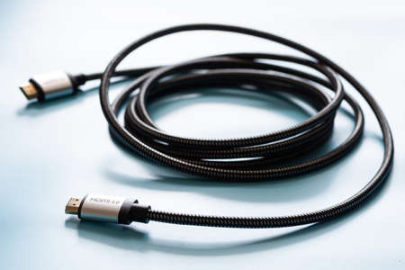 HDMI Cable connector and copy space on blue background color mood and tone styleの写真素材