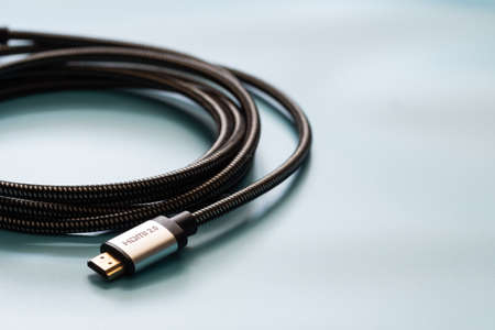 HDMI Cable connector and copy space on blue background color mood and tone styleの写真素材