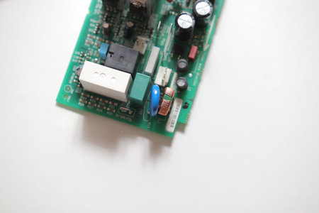 Power Supply modern printed-circuit board with electronic components with transistor. PCB detail....