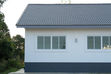 Modern home exterior residential area architecture minimalist design straight-on view contemporary...