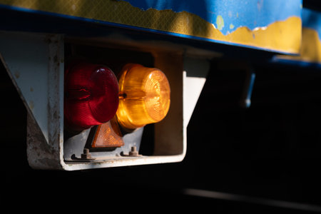 Warning signal lights train station close-up industrial environment low angle safety conceptの写真素材