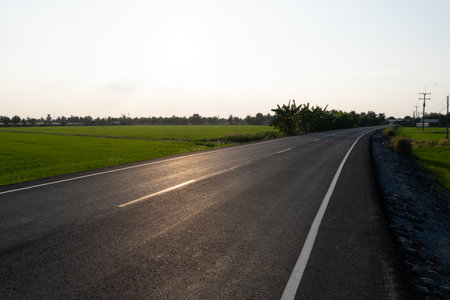 Scenic road journey rural landscape photography open fields wide angle adventureの写真素材