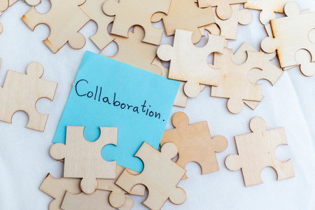 Enhancing business collaboration through puzzle pieces office space digital content creative environment unique viewpoint teamwork conceptの写真素材