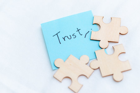 Building business trust a puzzle of relationships office space visual content professional environment close-up connection conceptの写真素材