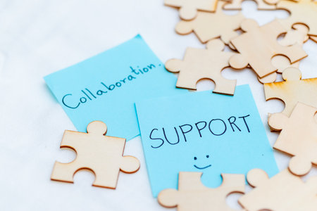 Collaboration and support in business office environment conceptual imagery creative perspective for team dynamicsの写真素材