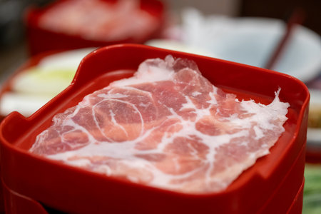 Sizzling beef slice preparation asian restaurant culinary art cozy environment close-up view food...