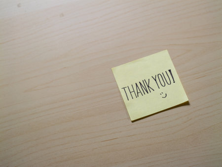 Gratitude note on sticky pad home office personal touch indoor close-up appreciationの写真素材