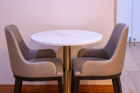 Cozy dining setup modern apartment interior design for a warm comfortable spaceの写真素材