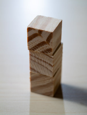 Building a wooden block tower home workshop photography indoor close-up creativity